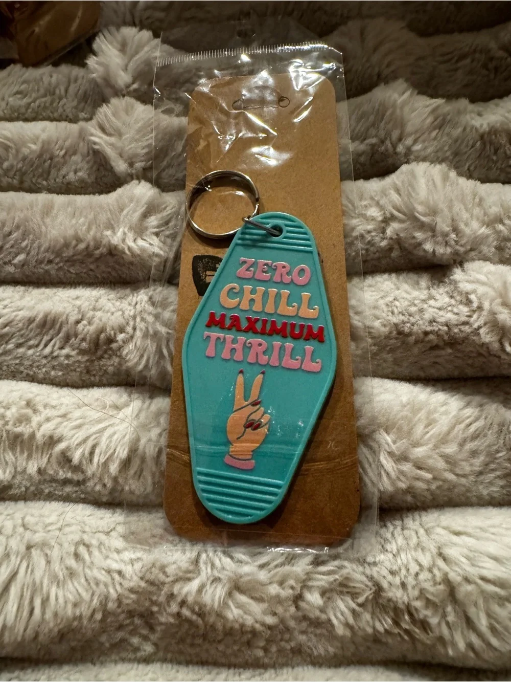 Turquoise 'Zero Chill Maximum Thrill' Hotel Keychain